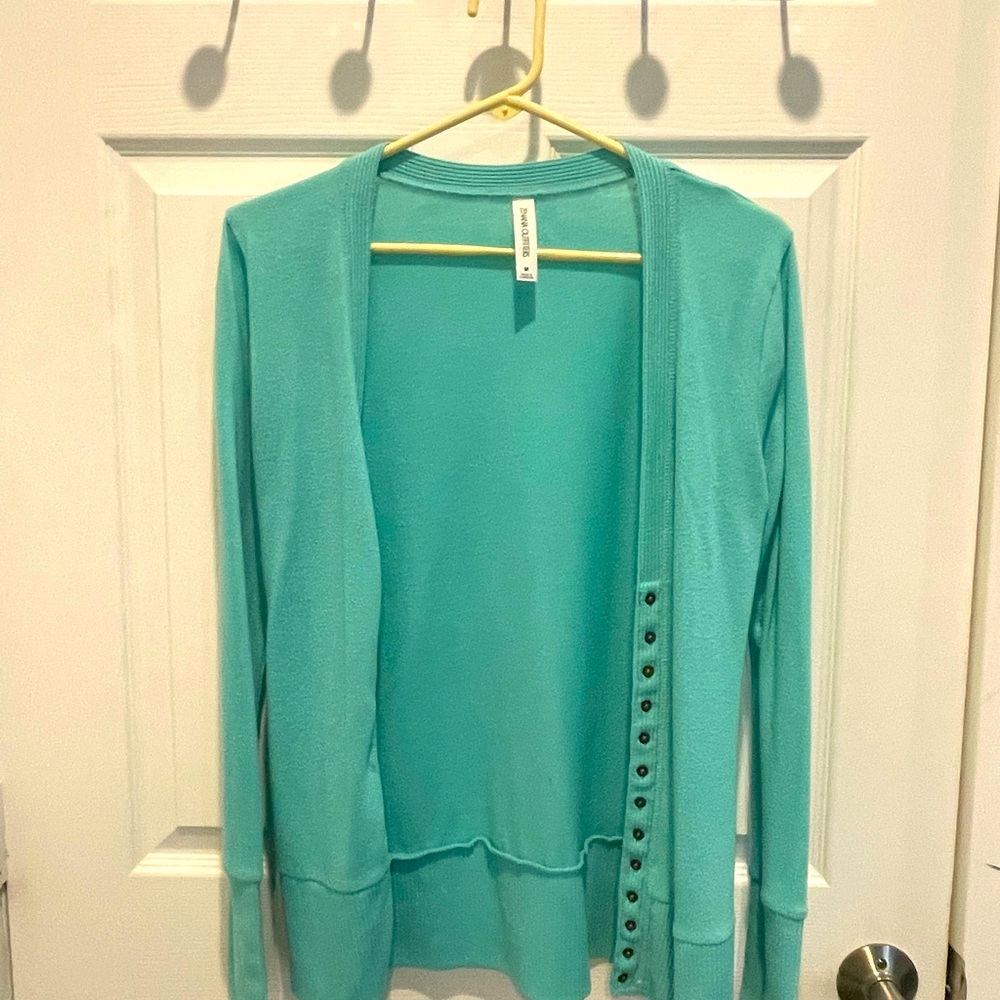Womens knit sweater. Turquoise, size medium.